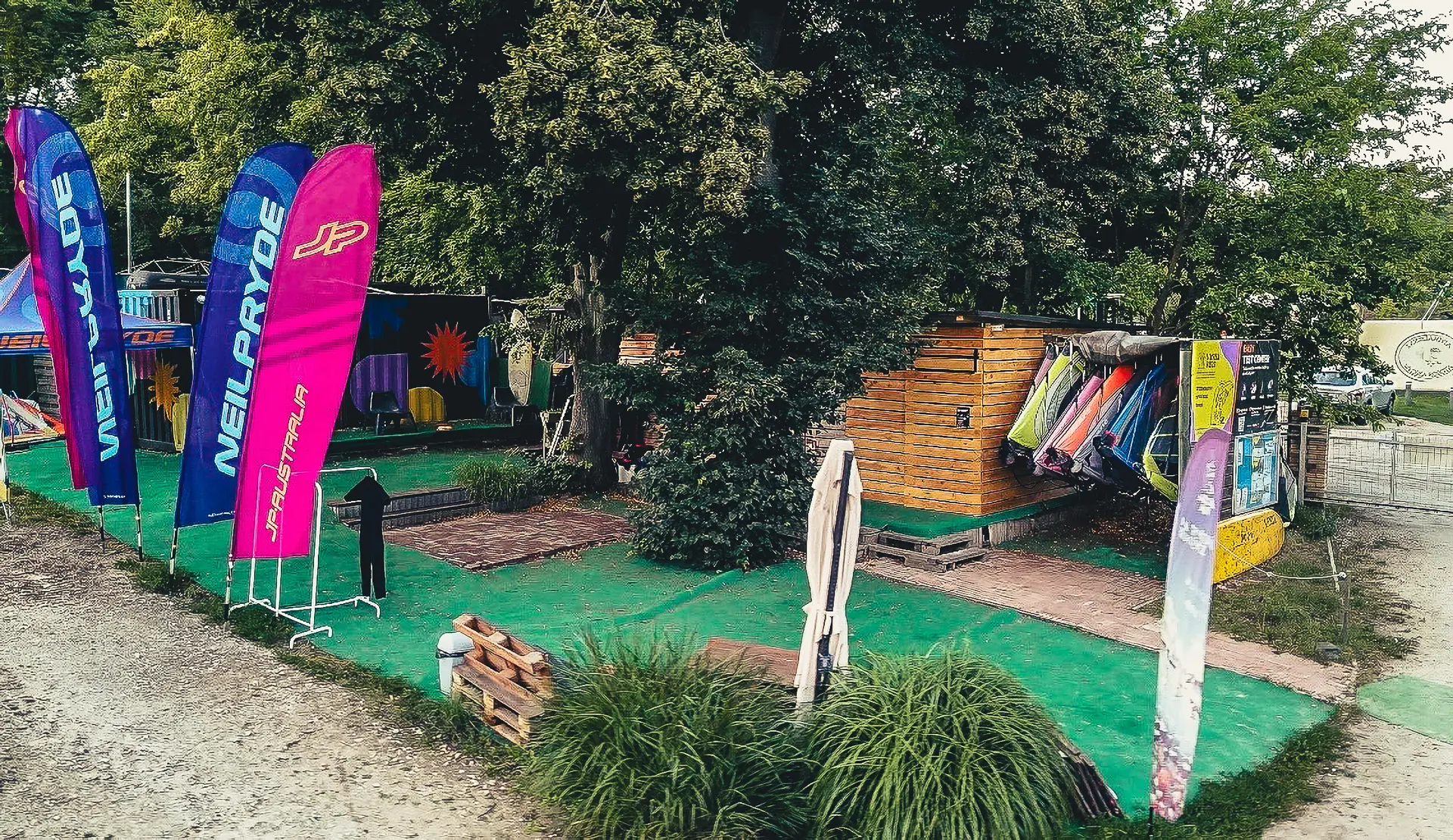 EASY Test Center Kiekrz — JP-Australia and NeilPryde flags at the Mysza Surf school